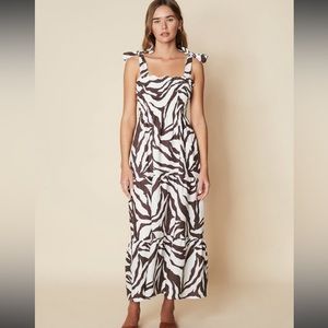 NWOT FAITHFULL THE BRAND
Rianne Midi Dress In Animal Print